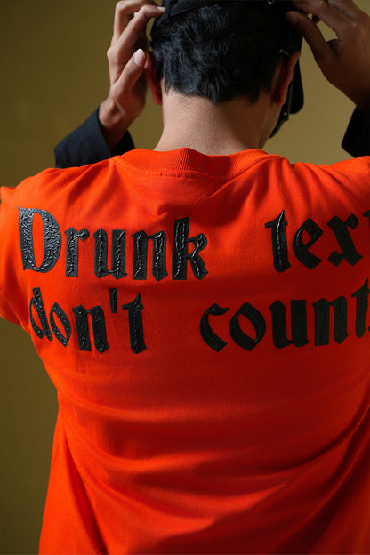 Buy Drunk Text Orange oversized T-shirt Online at Main Character India