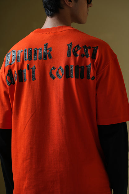 Buy Drunk Text Orange oversized T-shirt Online at Main Character India